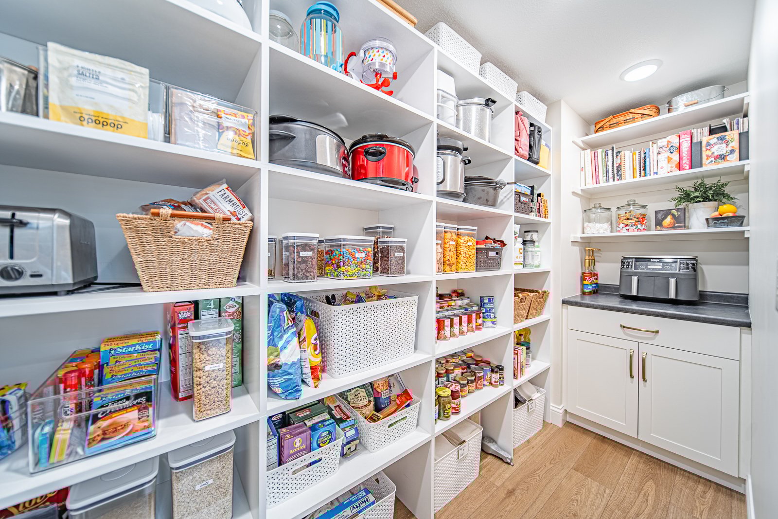 6711562e686f93c955d3d8e2_66b662843b666680e01b855a_west-lafayette-kitchen-hidden-pantry-02-1