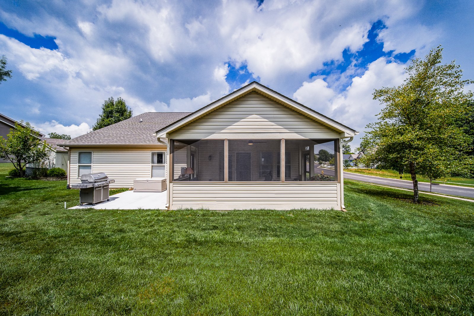cozy screened porch seating area