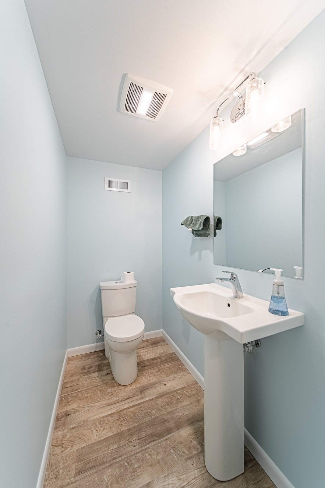 basement-bathroom-vanity-toilet-light-blue
