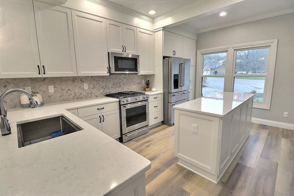 Check out this lovely kitchen remodel on Jester Court in Lafayette done by Riverside Construction. This L-shaped white kitchen is perfect for any home!
