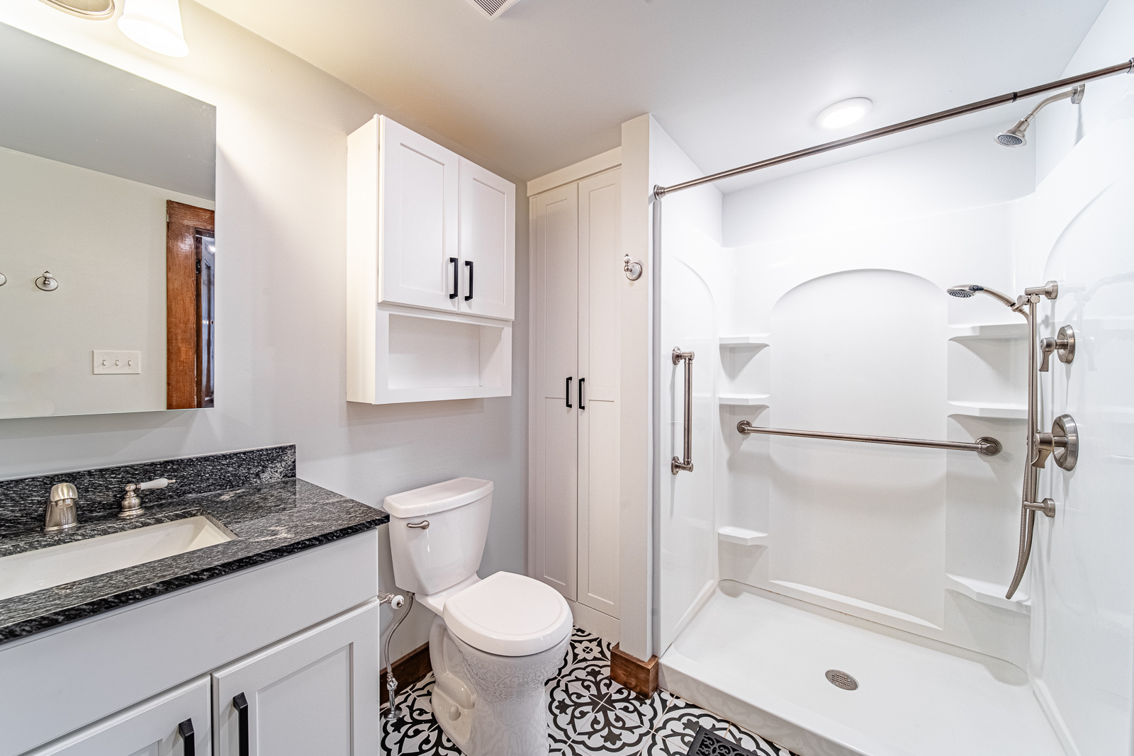 Discover the transformation of a Lafayette home on N. 21st Street, featuring a sleek kitchen and bathroom remodel with custom storage solutions and cohesive designs.