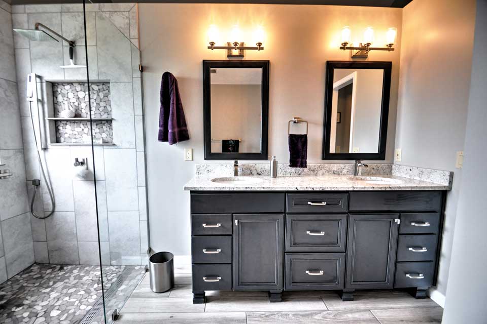 Having worked with Riverside before on two prior home remodeling projects, this Lafayette couple came back to Riverside and asked us to renovate their master bathroom. While the layout of the bathroom still worked for the couple, they were looking to replace a rarely used bathtub with a spa-inspired shower, and update the overall look of the space to a more current and fresh feel.-Drive-Lafayette-Transitional-Bathroom-Remodel