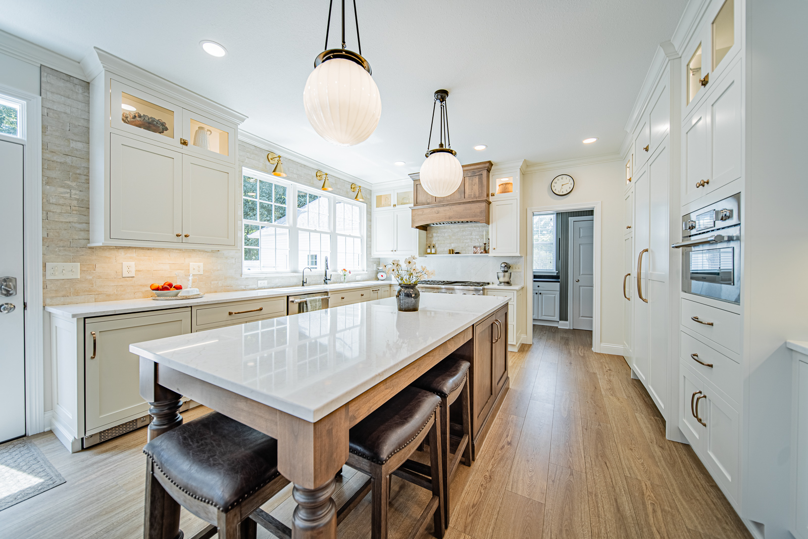 Experience the transformation of a West Lafayette kitchen into a sleek, modern farmhouse-inspired space with custom cabinetry, quartz countertops, and high-end finishes.