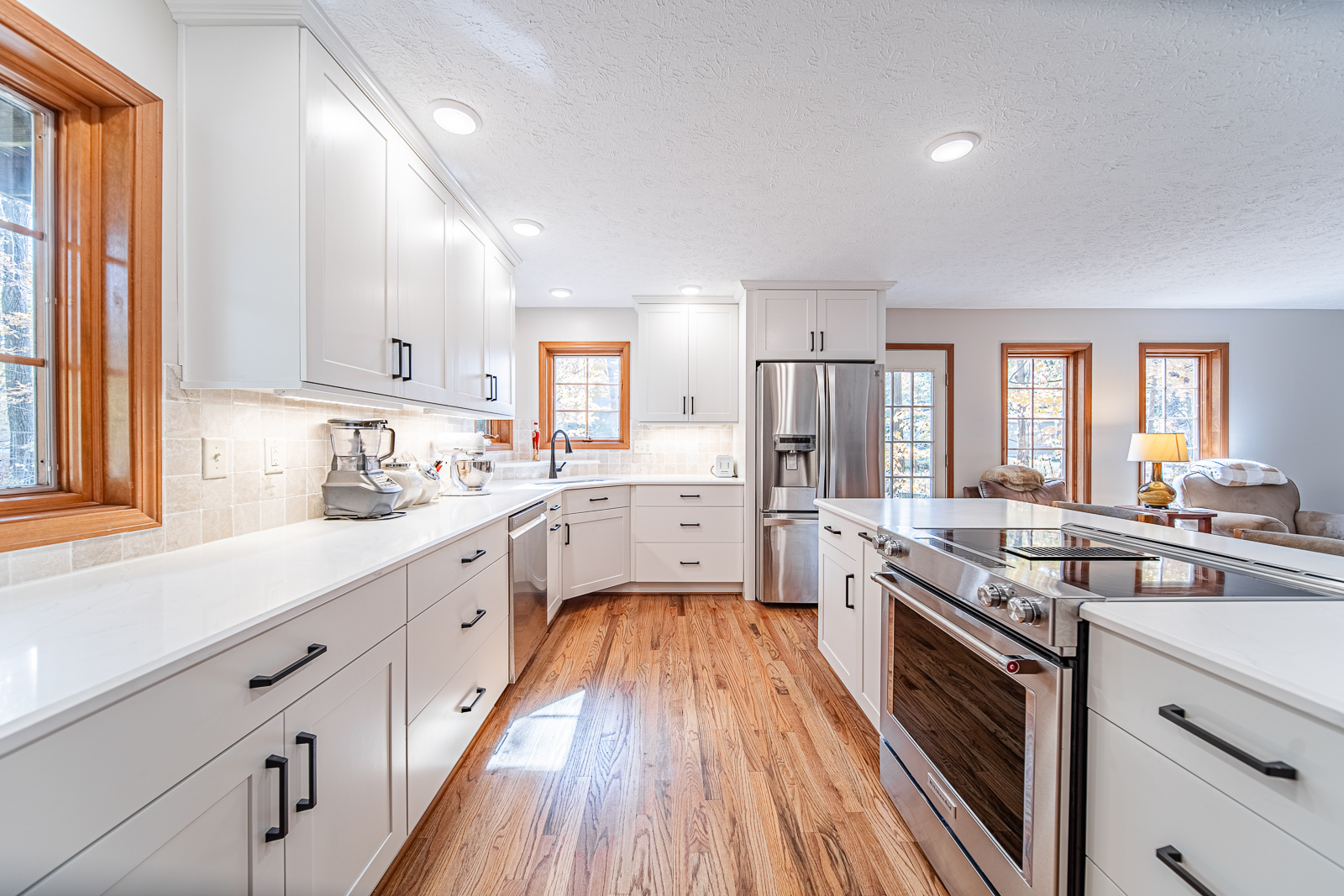 This West Lafayette remodel transformed a dated kitchen and living room into a bright, functional, and inviting space with modern design features and finishes.
