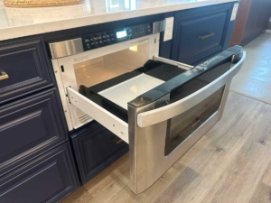 Riverside Construction Remodeling Showroom - Kitchen pull-out microwave
