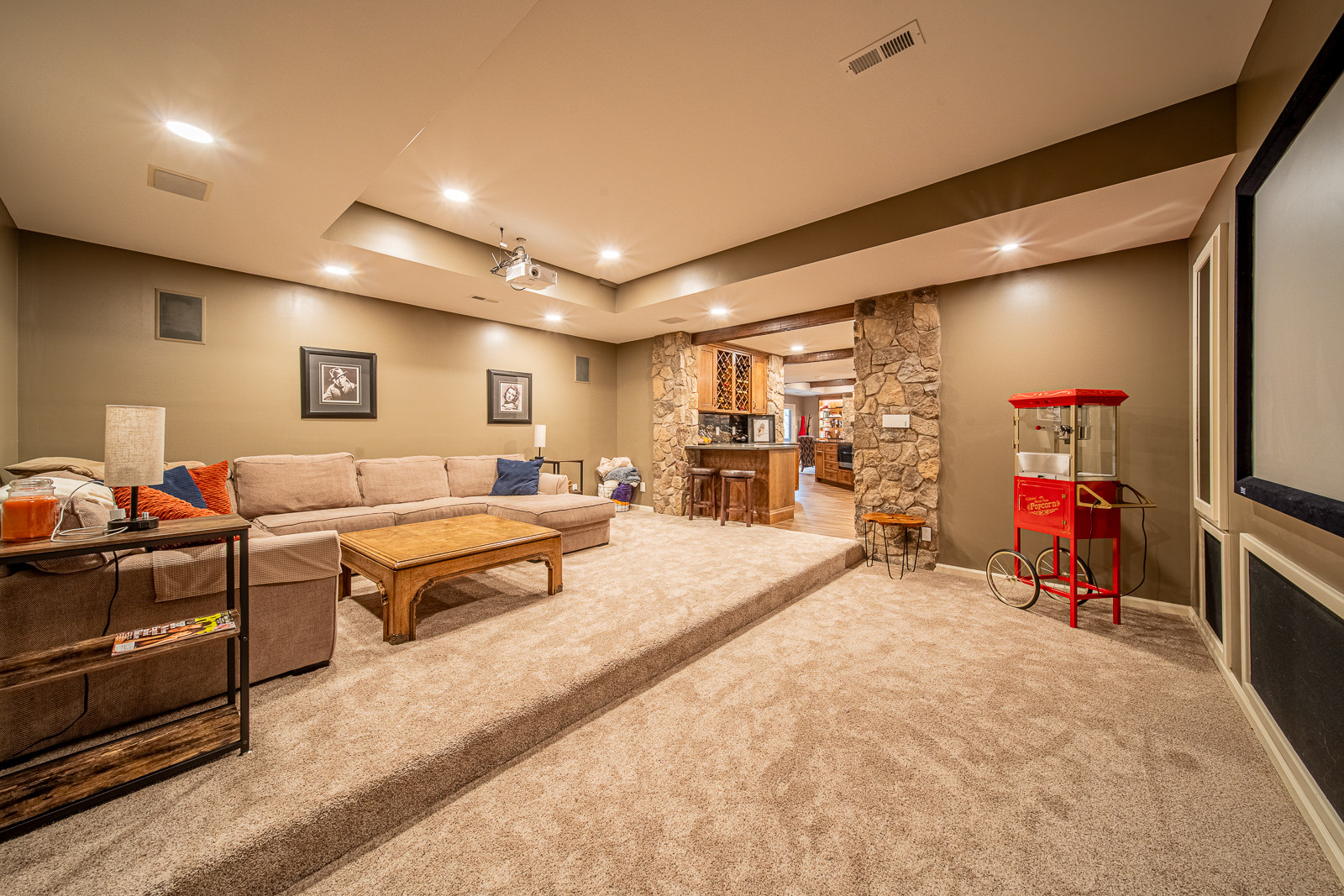 Comfortable and stylish living room area in Lafayette's Ripple Creek Drive basement remodel.