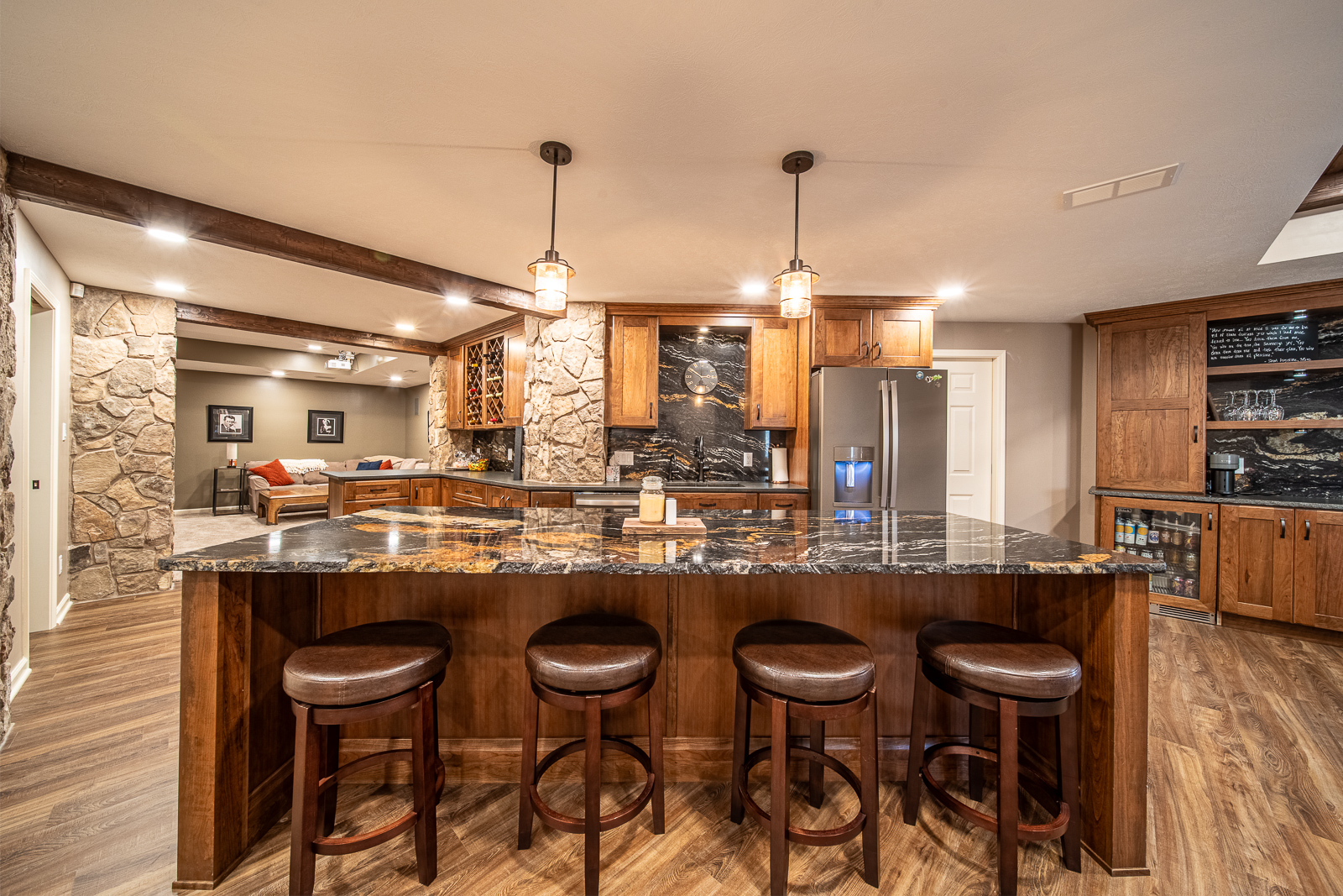 Basement kitchen on Ripple Creek Drive with stylish bar seating and modern design.