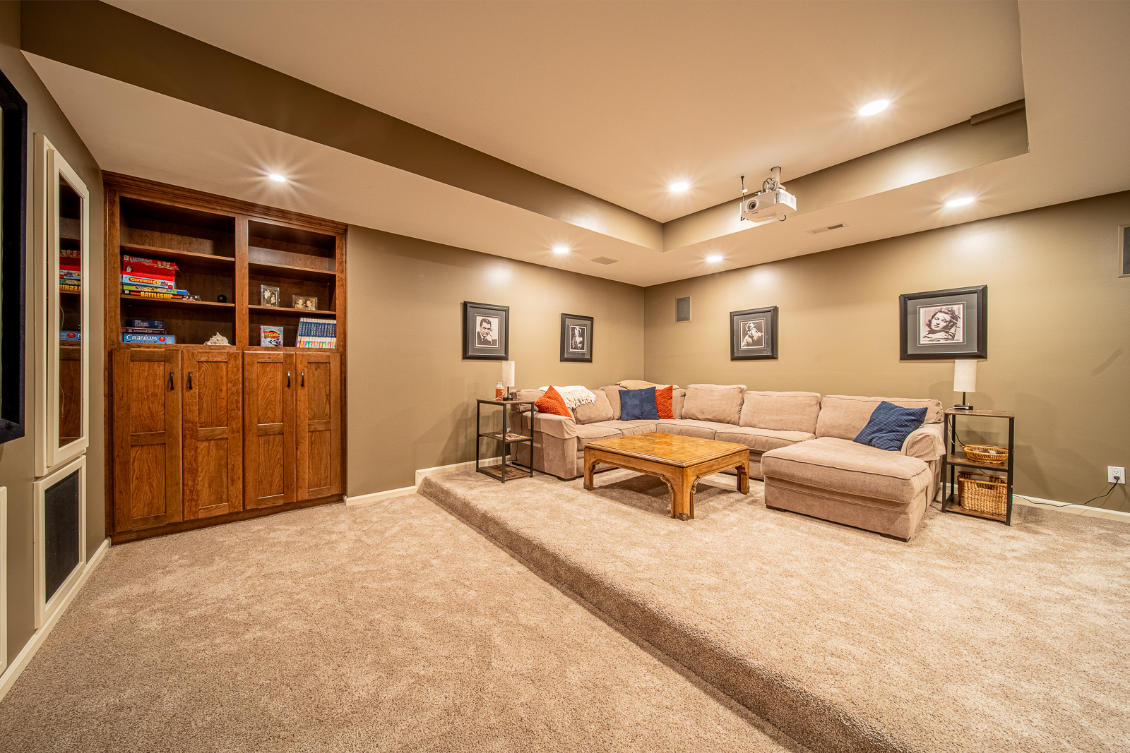 Modern and rustic living room design in the renovated basement on Ripple Creek Drive.