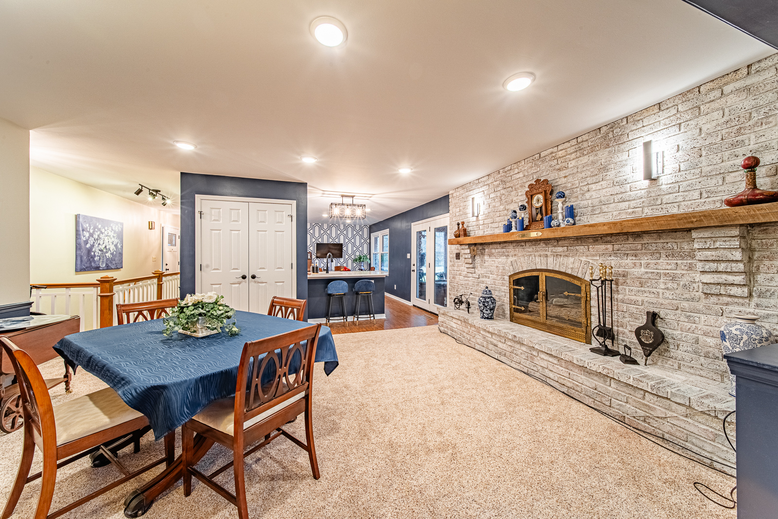Elegant dining room in Lafayette with fireplace, offering a serene dining experience.