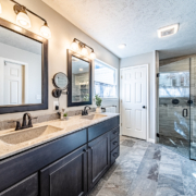 Overall view of a newly remodeled bathroom in Lafayette showcasing modern design and accessibility.
